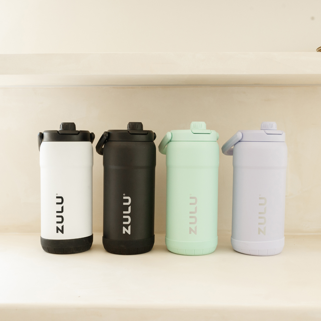 goals-mammoth-101oz-stainless-steel-bottle-u7 GoalsMammothAllColorsLifestyle.png